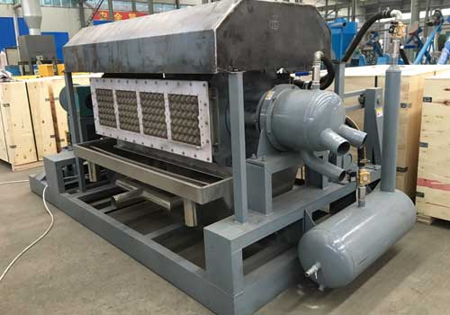 Machine de fabrication de boîtes à œufs